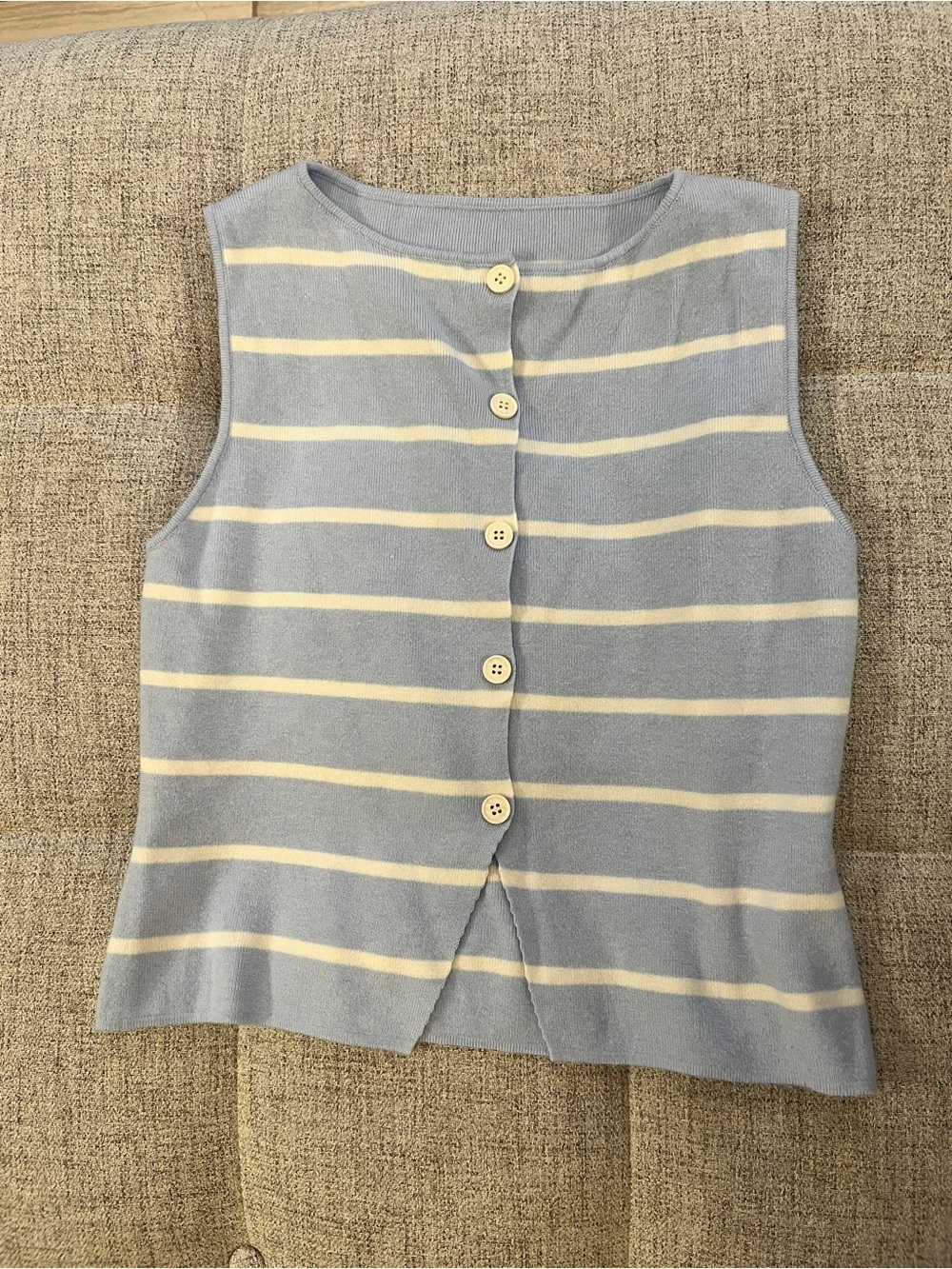 Cider blue and cream striped button up vest in size L.
